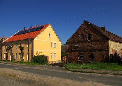 Fassadendämmung UdiFRONT von Udidämmsysteme, Sanierung eines Vielseitenhofes